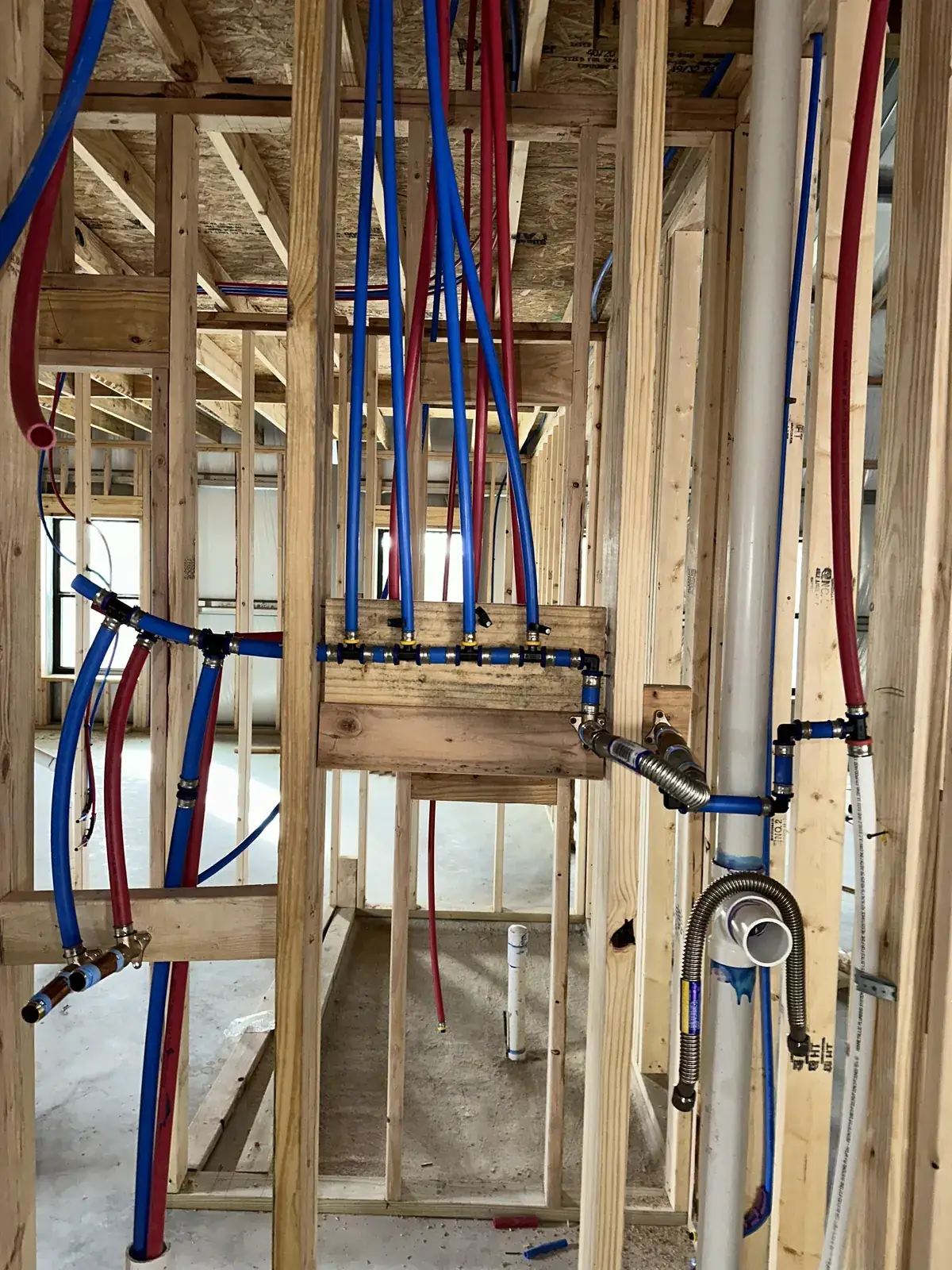 PEX piping manifold installed during a whole-house repipe in a Southern California home