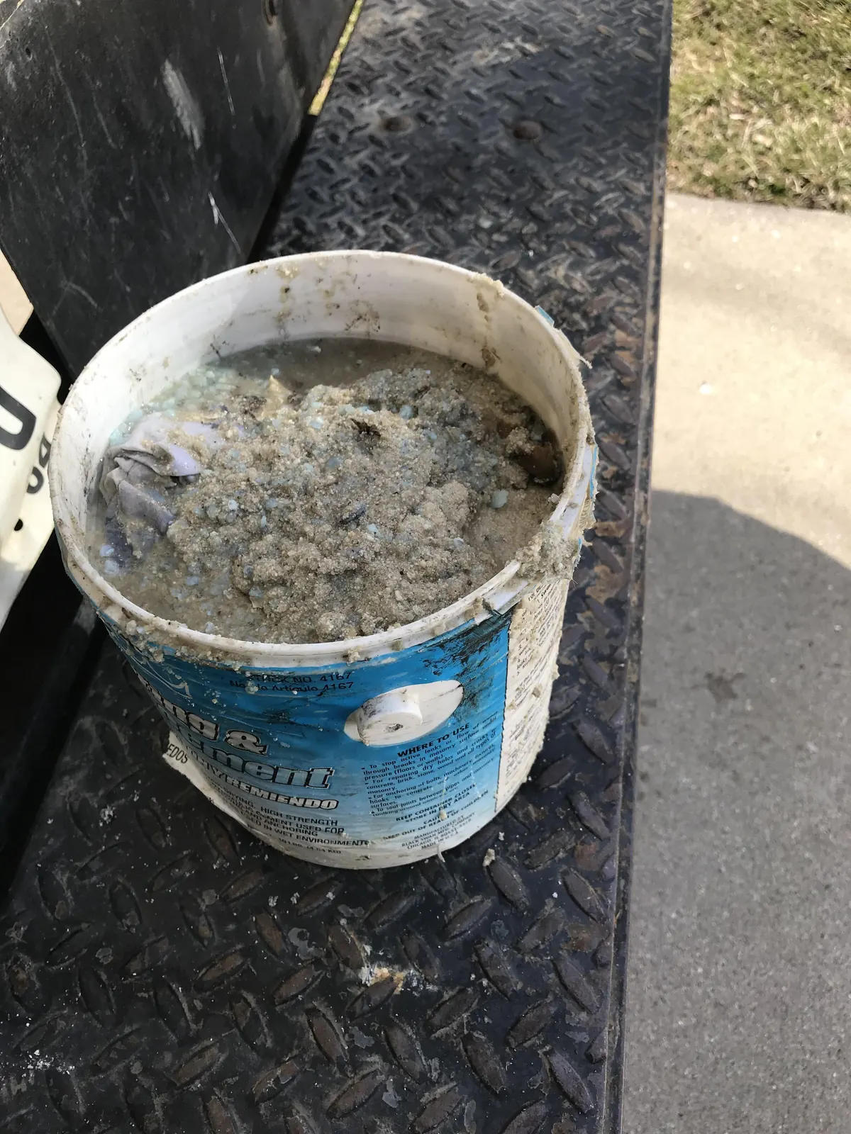 Sediment buildup drained from the bottom of a rumbling water heater tank